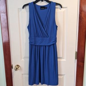 V-neck tank style dress band at waist fit to flare